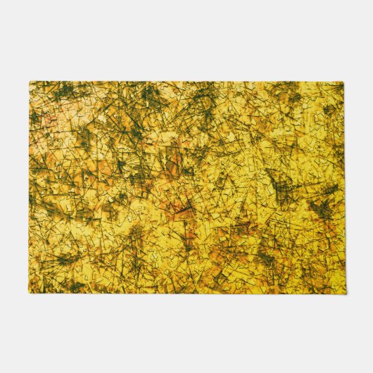 Scratches auf einem leicht gepunkteten ochgelben B Fußmatte (Vorderseite)