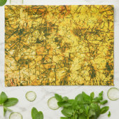 Scratches auf einem leicht gepunkteten ochgelben B Geschirrtuch (Gefaltet)