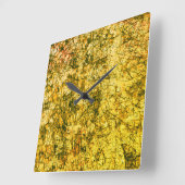 Scratches auf einem leicht gepunkteten ochgelben B Quadratische Wanduhr (Winkel)