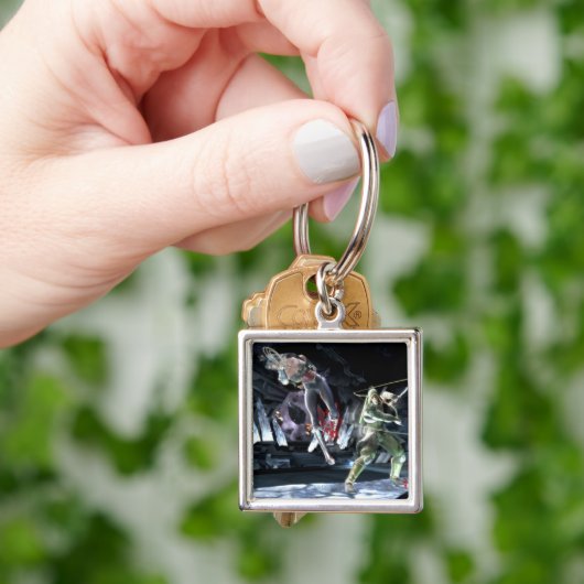 Screenshot: Wonder Woman vs Green Arrow Schlüsselanhänger (Hand)