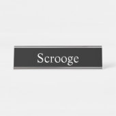 Scrooge, Schreibtischnamensplakette (Vorderseite )