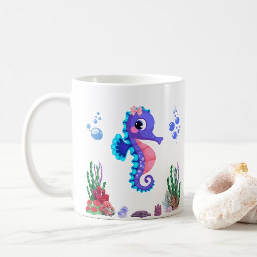 Seahores spielerisch unter der Tasse des Kaffees (Mit Donut)
