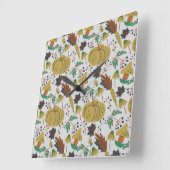 Seamless pattern of tropical pumpkins and carrots quadratische wanduhr (Winkel)