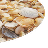 Seashell strukturierte Sommer Strand Hintergrund. Schneidebrett (Ecke)