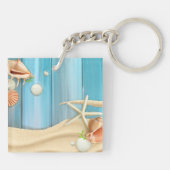 Seashells auf Sand Schlüsselanhänger (Rückseite)