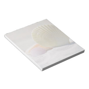 Seashells im weißen Sand Notizblock