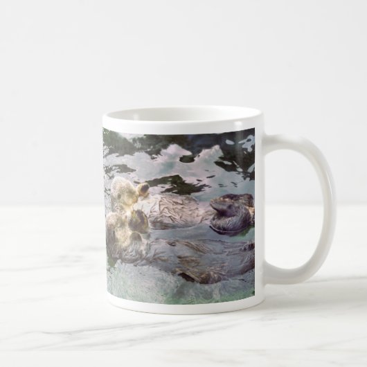 Seeotter, die Hände halten Kaffeetasse (Rechts)