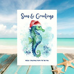 Seepferd Santa Seas & Greetings Nautische Weihnach Feiertagskarte<br><div class="desc">Feiern Sie die Saison mit einem Spritzer! Diese nautische Weihnachtskarte verfügt über ein charmantes Seepferd mit einer Weihnachtsmannmütze und einem abstrakten Meereshintergrund in tropischem Türkis,  Marineblau,  Gold und Grün - ideal,  um Ihren Urlaub "Seas & Greetings" mit einem Strandvibe zu verbinden. Kunst von KL Stock</div>