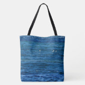 Segel über der Bucht auf einem Tasche (Rückseite)