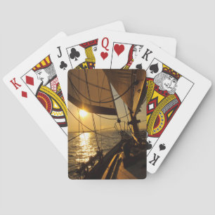Segelbootdeck, in Richtung untergehende Sonne Spielkarten