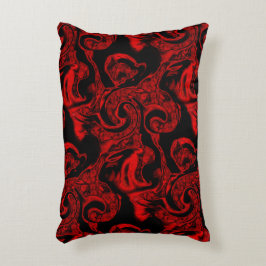 Sehr farbige rote Spiralteile auf schwarzem Hinter Dekokissen