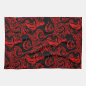 Sehr farbige rote Spiralteile auf schwarzem Hinter Geschirrtuch (Horizontal)