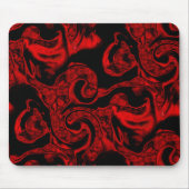 Sehr farbige rote Spiralteile auf schwarzem Hinter Mousepad (Vorne)