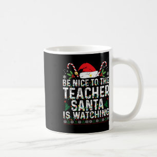 Sei nett zu dem Lehrer, den der Weihnachtsmann vor Kaffeetasse