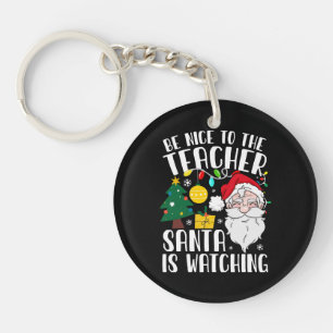 Sei nett zum Lehrer, der Weihnachtsmann beobachtet Schlüsselanhänger