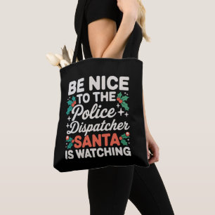 Sei nett zum Polizeidispatcher Santa beobachtet Tasche