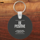 Seien Sie ein positiver Schlüsselanhänger (Vorderseite)