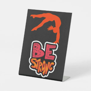 Seien Sie starke Gymnastik Sockelschild