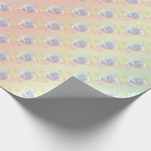 Seifenblasen auf dem Rainbow Geschenkpapier (Ecke)