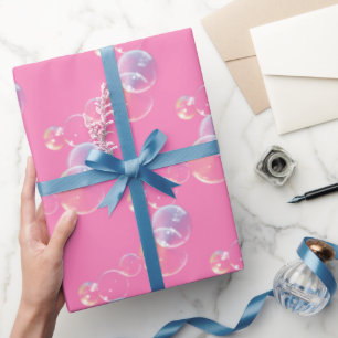 Seifenblasen auf rosa geschenkpapier