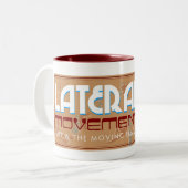 Seitliche Bewegung: Kunst u. die bewegliche Zweifarbige Tasse (Vorderseite Links)