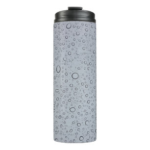 Selektive Fokusfotografie von Wassertröpfchen Thermosbecher