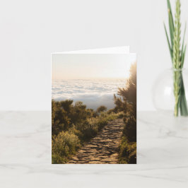 Serene path above the clouds with golden sunrise karte