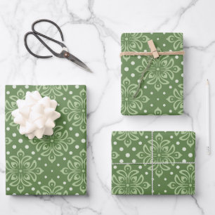Seriöses Blumenmuster auf grünem Hintergrund Geschenkpapier Set