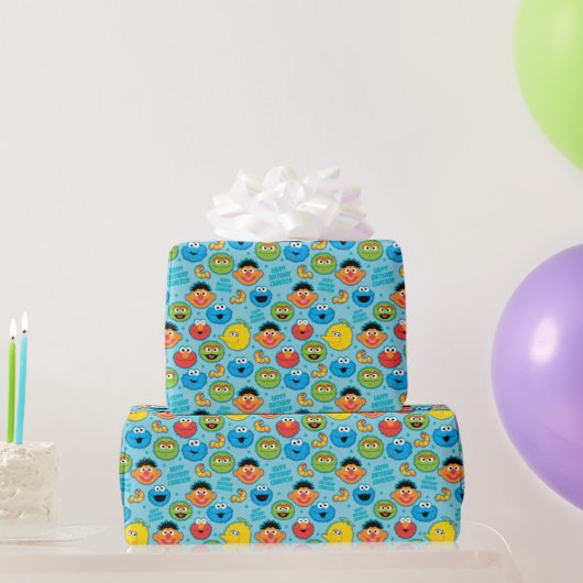 Sesame Street Faces Pattern on Blue Geschenkpapier (Partygeschenke)