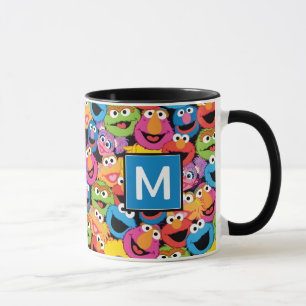 Sesamstraße-Zeichen gegenüber Monogramm Tasse
