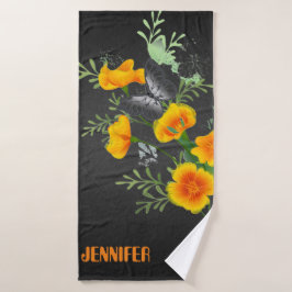 Set mit schwarzem Handtuch und Schmetterling