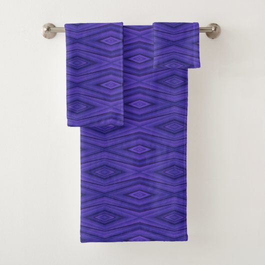 Set of two purple towels featuring geometric  (Insitu)