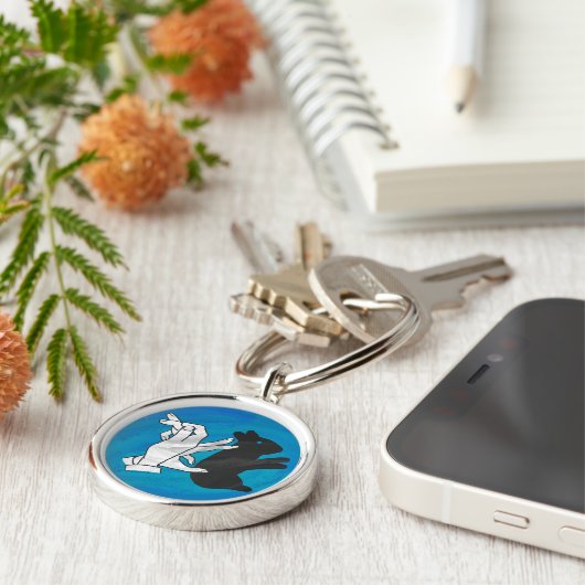 Shadow Rabbit auf blau Schlüsselanhänger (Seite)