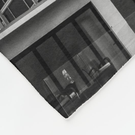 Shadows and Steel: The Silent Giant in the City Fleecedecke (Ecke)