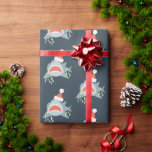 Shark Santa Claus Blue Christmas Holiday Geschenkpapier<br><div class="desc">Diese niedliche Weihnachtsverpackung mit marineblau-blauem Hintergrund mit Haimustern mit Weihnachtsmannmütze und Weihnachtsbeleuchtung. Ändern Sie die Hintergrundfarben und personalisieren Sie sie für Ihre Bedürfnisse. In meinem Geschäft finden Sie passende Produkte.</div>