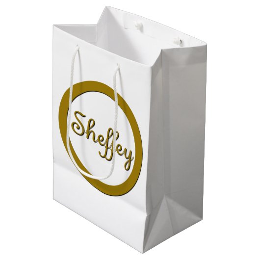 Sheffey Monogram in Gold Mittlere Geschenktüte (Vorderseite Schrägansicht)