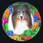 Sheltie Christmas Open Geschenke Tri Color Runder Aufkleber<br><div class="desc">Können wir sie JETZT öffnen? Kleiner Sheltie Pup kann nicht warten,  in seine (oder ihre) Geschenke zu reißen! Sicher ein Urlaubsfavorit! Weihnachtskunstwerk von Danes-R-Us ist in Sheltie Farben erhältlich: bi-schwarz,  bi-blau,  blau merle,  Einzel- und Dreifarben.</div>