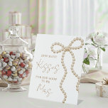 She's Tying the Knot Bridal Shower How Many Kisses Sockelschild<br><div class="desc">Add a playful and interactive element to your celebration with this elegant “She’s Tying the Knot” How Many Kisses bridal shower pedestal sign, perfect for game tables and activity stations. Designed to complement chic, feminine, and romantic bridal shower themes, this sign guides guests to participate in the fun guessing game...</div>