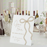 She's Tying the Knot Bridal Shower Open Bar Sockelschild<br><div class="desc">Add a fun and stylish touch to your celebration with this elegant “She’s Tying the Knot” bridal shower open bar pedestal sign, perfect for drink stations and bar displays. Designed to complement chic, feminine, and modern bridal shower themes, this sign helps guests easily locate the open bar while enhancing your...</div>