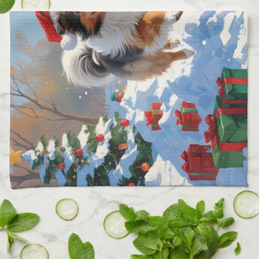 Shetland Sheepdog läuft Schnee mit Weihnachtshut Geschirrtuch (Gefaltet)