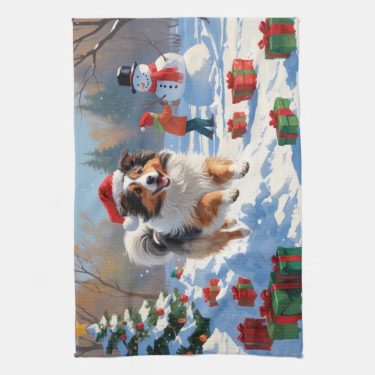 Shetland Sheepdog läuft Schnee mit Weihnachtshut Geschirrtuch (Vertikal)