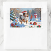 Shetland Sheepdog läuft Schnee mit Weihnachtshut Rechteckiger Aufkleber (Tasche)