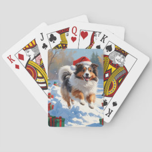 Shetland Sheepdog läuft Schnee mit Weihnachtshut Spielkarten