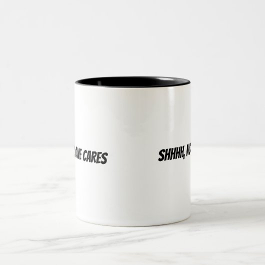 Shhhh, niemand interessiert sich zweifarbige tasse (Mittel)