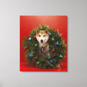 Shiba Inu Hund, der im WeihnachtsKranz sitzt Leinwanddruck