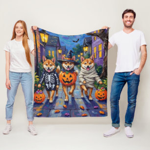 Shiba Inu Hunde in Halloween-Kostümen Fleecedecke