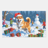 Shiba Inu läuft im Schnee mit Weihnachtsmütze Rechteckiger Aufkleber (Vorderseite)