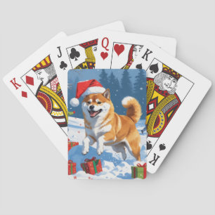 Shiba Inu läuft im Schnee mit Weihnachtsmütze Spielkarten