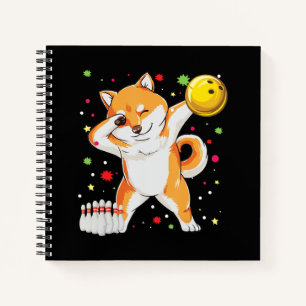 Shiba spielt Bowling Witziger Hund mit Bowling Notizblock
