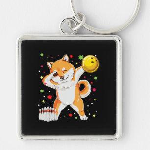 Shiba spielt Bowling Witziger Hund mit Bowling Schlüsselanhänger